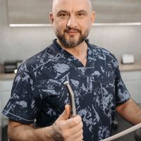 Expert trainer Bogdana Chernenko smiling confidently.